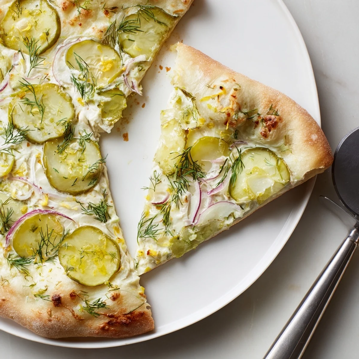 Savory Pickle Pizza with rich crème fraîche and crunchy dill pickles for a unique taste.  
