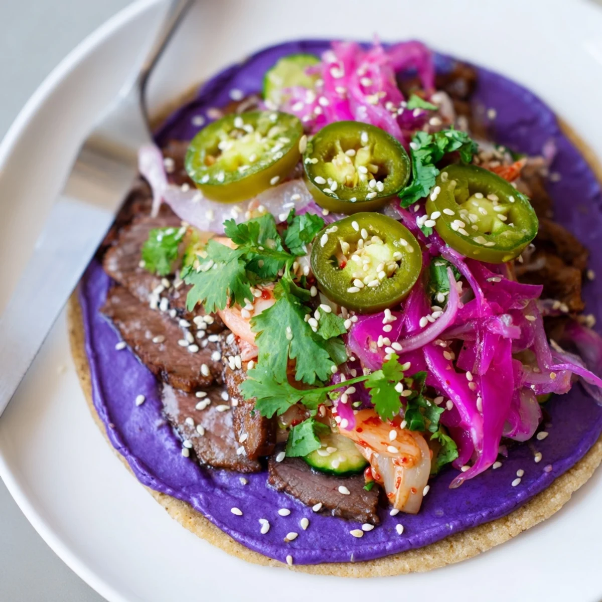 Vibrant Global Street-Food Fusion Tacos showcasing colorful toppings and rich ube crema.  