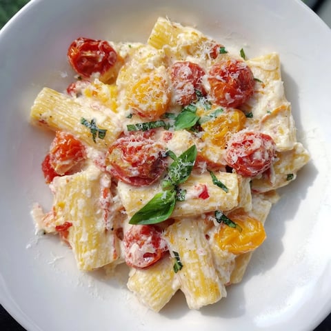 Four-Cheese Baked Block Pasta: a bubbly, molten cheese creation with roasted tomatoes and basil.