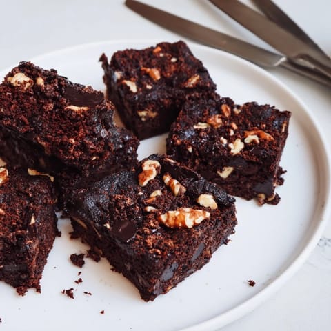 Decadent zero-waste brownies featuring leftover nut-milk pulp and chocolate chips.  