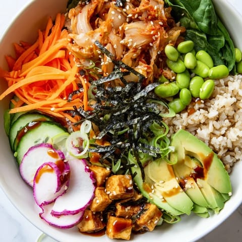Vibrant and nourishing Fermented Vegetable Bowl featuring kimchi, seasoned grains, and crisp toppings.  