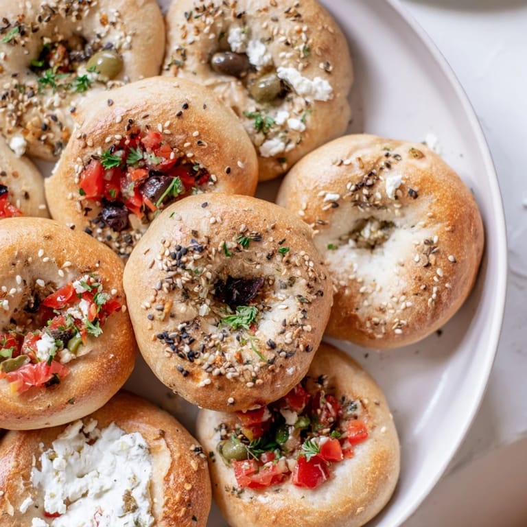 Enjoy this simple vegetarian Cobblestone Courtyard, an inviting appetizer with varied olives and crackers on a platter.